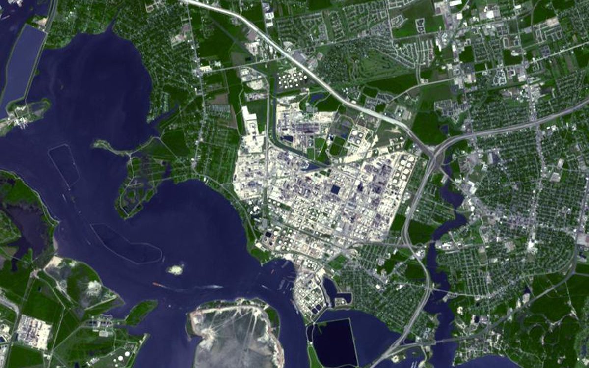 With a refining capacity of over 560,000 barrels per day, ExxonMobil’s Baytown refinery in Texas is the largest refinery in the United States. And with 970 hectares of intensely industrialized land within its perimeter, this is one of the largest industrial sites in the world. In addition to the refinery, ExxonMobil Chemical operates two petrochemical plants on the site, making 13 billion pounds of chemicals a year for a variety of industries and products. The refinery opened in 1919, by the Humble Oil Company, which later became Exxon. The 4 kilometer wide plant employs over 4,000 people. The image was acquired October 1, 2003, covers an area of 9 x 12 km, and is located at 29.7 degrees north latitude, 95 degrees west longitude.
