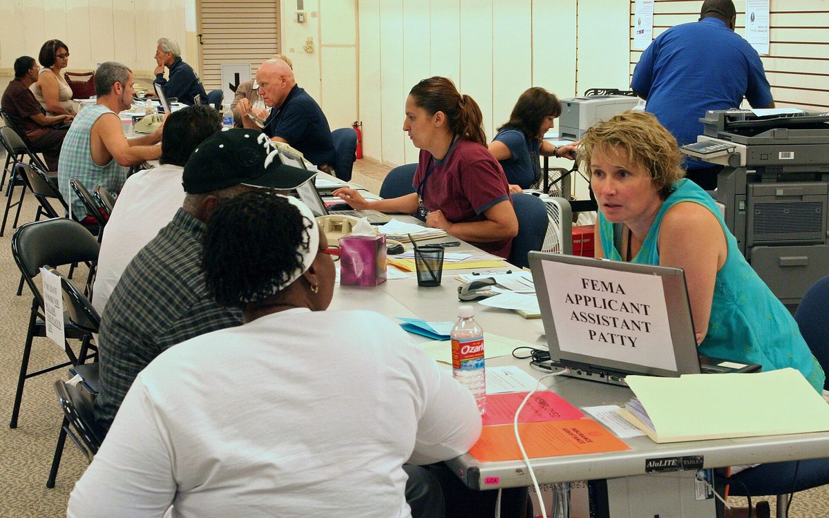 Baytown, TX, October 1, 2008 -- Applicants from eastern Harris County came to the Disaster Recovery Center at San Jacinto Mall to register for FEMA aid.  Other agencies on site include the SBA, the U.S. Army Corps of Engineers, the Texas Department of Insurance, The Texas Unemployment Office, and a family counseling service.  Photo by Greg Henshall / FEMA