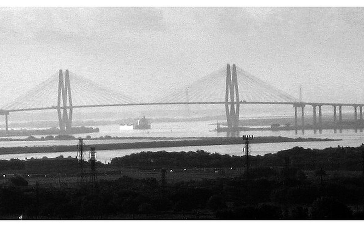 The Fred Hartman Bridge located in Baytown, Texas on the Houston Ship Channel, as seen from an elevated position on the southwest side of the channel.