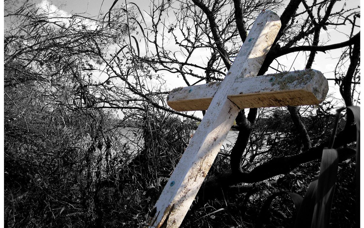 I came up on this white cross on the Goose Creek Trail that was evidently washed up by Hurricane Ike.