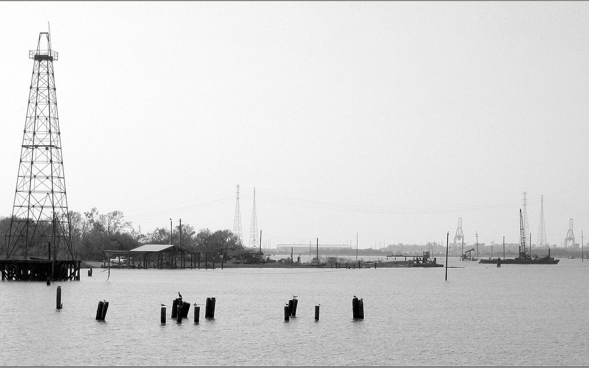 Lone Derrick at the mouth of Goose Lake, Baytown, Texas.  I took this photo while Urban Trekking on SH-146.