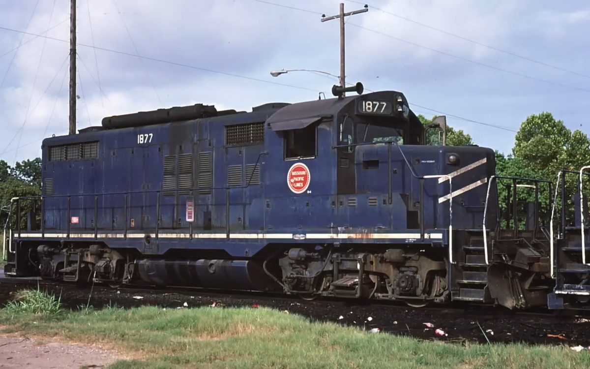 Missouri Pacific 1877 was built in May 1960 by EMD under the builder's number of 26021, originally built as MP 4825, later became MP 530, and then MP 1877, was seen at Baytown, Texas in August 1980.