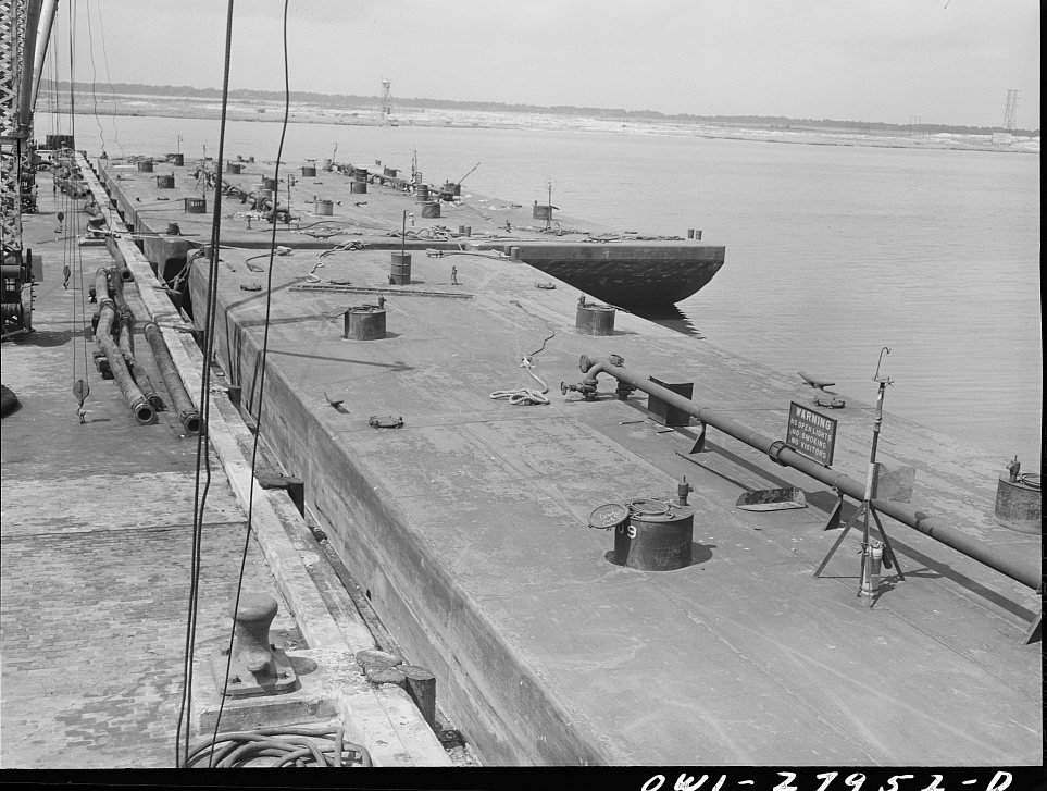 Baytown, Texas. Barges to be loaded with oil at a refinery