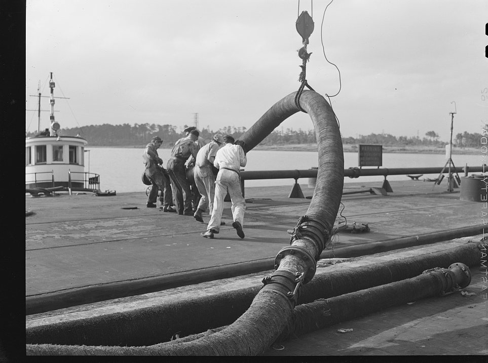 Baytown, Texas. Loading an oil barge